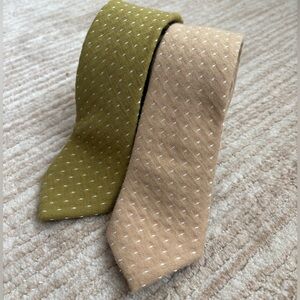 Set of two men’s boon ties, one green one tan